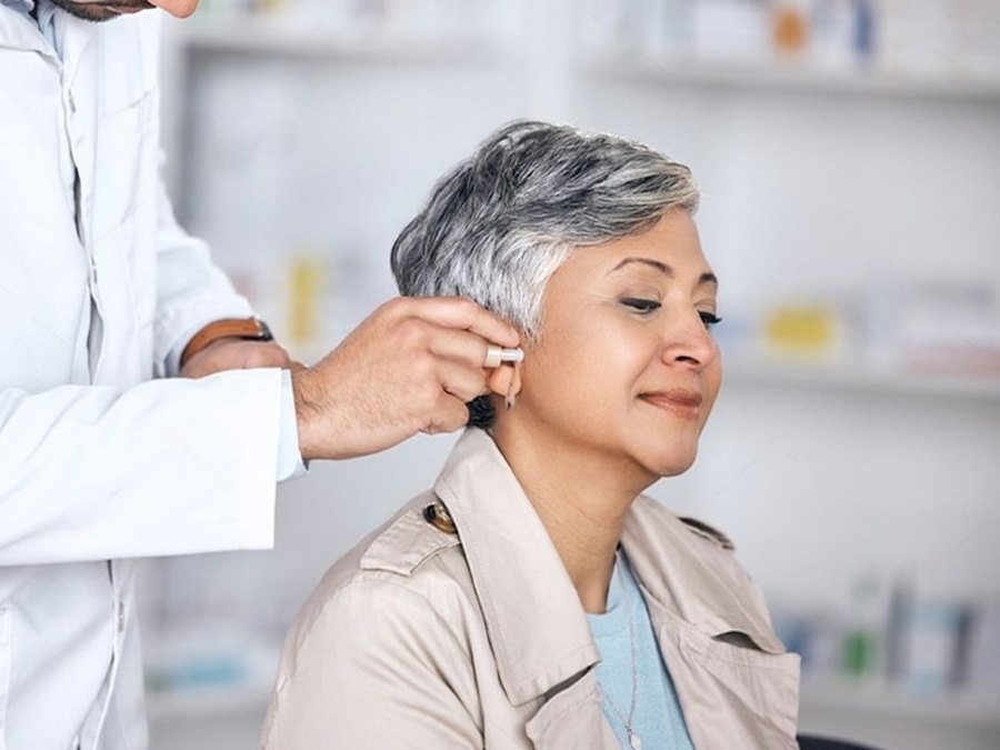 Hearing device being fitted for a patient at Gurgaon ENT Clinic