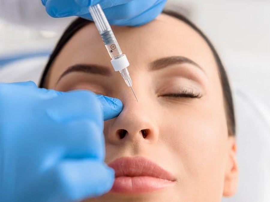 Nasal procedure being performed on a patient during rhinoplasty care
